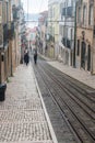 Rua da bica de duarte belo street with famous Bica Funicular (Portuguese: Ascensor da Bica).