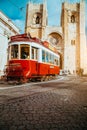 LISBON, PORTUGAL - December 31, 2017: Street view with famous old historic tourist red tram in front of the main Lisbon Royalty Free Stock Photo