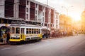 LISBON, PORTUGAL - December 31, 2017: Street view with famous old historic tourist yellow tram. Famous vintage tourist Royalty Free Stock Photo