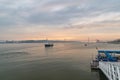 Sunset view on River Tagus with 25 de Abril bridge (25th of April Bridge
