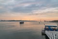Sunset view on River Tagus with 25 de Abril bridge (25th of April Bridge) in background