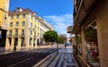 Lisbon Portugal. Empty wide street with storefront