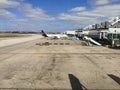Exterior view of the runway and lift and maintenance of aircraft at Lisbon airport with Lufthansa airplane, cargo working