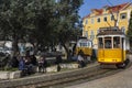 Lisbon street with traditional yellow trams