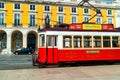 Vintage street car in the old city centre of Lisbon. Royalty Free Stock Photo