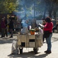 Lisbon, Portugal: hawker woman selling roasted chestnuts in Rossio