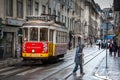 LISBON, PORTUGAL - January 31, 2011: The mythical tram line 28 through the historical center of Lisbon