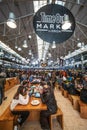 Time Out Market Lisboa. Crowd of people eating.