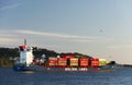 LISBON, PORTUGAL - JULY, 06, 2018: Cargo ship floating on the river Tagus in Lisbon, Portugal.