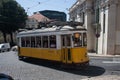 LISBON, PORTUGAL - July 23, 2011: Traditional yellow tram on a street in Lisbon