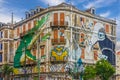 Lisbon street art. graffiti green crocodile. Painting house, Avenida Fontes Pereira de Melo, Lisboa, Portugal