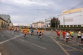 Marathon on the streets of Lisbon. Active people. Group of runners in the city. Urban sport. Competition and healthy activity.