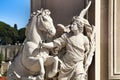 Beautiful stone carved sculptures at the base of King Joseph I statue