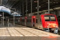 Regional red train at Rossio Railway Station in Lisbon