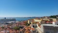 Lisbon, Portugal - March 2023: View of the roofs of the houses and the port. City real estate. Panorama of a beautiful city Royalty Free Stock Photo