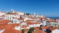 Lisbon, Portugal - March 2023: View of the roofs of the houses and the port. City real estate. Panorama of a beautiful city Royalty Free Stock Photo