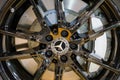 Car wheel disc with Mercedes-Benz car logo emblem close up Royalty Free Stock Photo