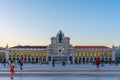 LISBON, PORTUGAL, MAY 29, 2019: People are passing Praca do Commercio square in Lisbon, Portugal Royalty Free Stock Photo