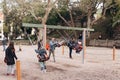 Lisbon, Portugal 01 may 2018: Playground with children and parents. Family with children or father and mother with kids