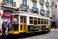 Traditional electric public transport called tram at the famous Luis de Camoes Square