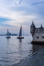 Lisbon Portugal. May 7, 2018. View of a portion of the famous tower of Bethlehem. Next to it, small sailboats sail on the river