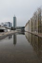 Lisbon, Portugal - Modern buildings and an artwork exposition of Fernando Conducto reflecting in a shalow water basin Royalty Free Stock Photo