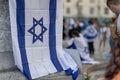 Lisbon, Portugal October 10, 2023. The flag of Israel in close-up on the background of a rally in support of Israel