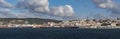 Panoramic view of the Lisbon port, with container ships unloading at the dock, in the city of Lisbon Royalty Free Stock Photo