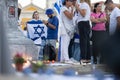 Lisbon, Portugal, October 10, 2023, People with the Israel flags standing at the memorial to the fallen Israelis in