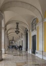 Lisbon, Portugal, October 30, 2021: People walking and shopping in market stands at Archway surrounding Praca do