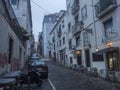 Lisbon, Portugal, October 30, 2021: View of street in Baixa at Lisbon center, Autumn rainy evening