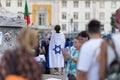 Lisbon, Portugal October 10, 2023. A woman at a rally in support of Israel, with the flag of Israel on her shoulders