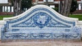 Lisbon, Portugal: old garden bench made with traditional tiles Royalty Free Stock Photo