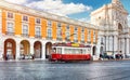 Lisbon, Portugal. Red tram at Commercial Square
