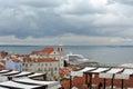 Lisbon. Portugal. Roofs of Alfama buildings. Tejo river. Travel Portugal. Old Europe. Red and white. Blue. Wonderful background.