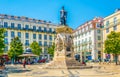 LISBON, PORTUGAL, SEPTEMBER 4, 2016: People are passing through Luis de Camoes square in Lisbon, Portugal Royalty Free Stock Photo