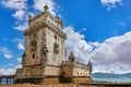 Lisbon, Portugal. Tower Belem at coast. Embankment alley with palm tree. Royalty Free Stock Photo