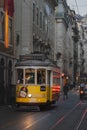 Lisbon, Portugal - 12/26/18: Traditional old yellow Electric tram in downtown lisbon Royalty Free Stock Photo