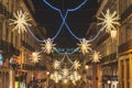 Lisbon, Portugal - 12/26/18: Yellow stars, Christmas decorations downtown