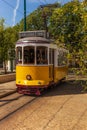 Lisbon`s famous yellow tram on a sunny day Royalty Free Stock Photo