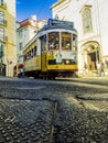 Lisbon`s legendary yellow tram. Streets of the Portuguese capital.