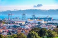 Lisbon skyline, cranes and cargo containers Royalty Free Stock Photo