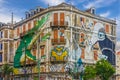 Lisbon street art. graffiti green crocodile. Painting house, Ave Royalty Free Stock Photo