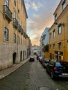 Lisbon streets sunset with cars Royalty Free Stock Photo