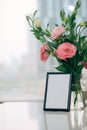 Lisianthus bouquet in the room with blank note