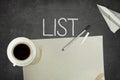 List concept on black blackboard with empty paper Royalty Free Stock Photo