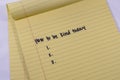 A list of three blank reasons and the text of how to be kind today on a yellow legal pad