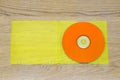 Listen to the music, orange cd and yellow plastic case Royalty Free Stock Photo
