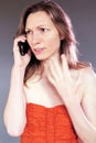 worried woman on cell phone beautiful young classy in cocktail dress