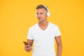 Listening concept. Best music apps. Listen good song. Guy modern user mobile application. Favorite music playlist. Music Royalty Free Stock Photo